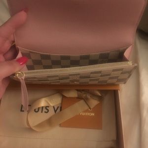 Louis Vuitton wallet.